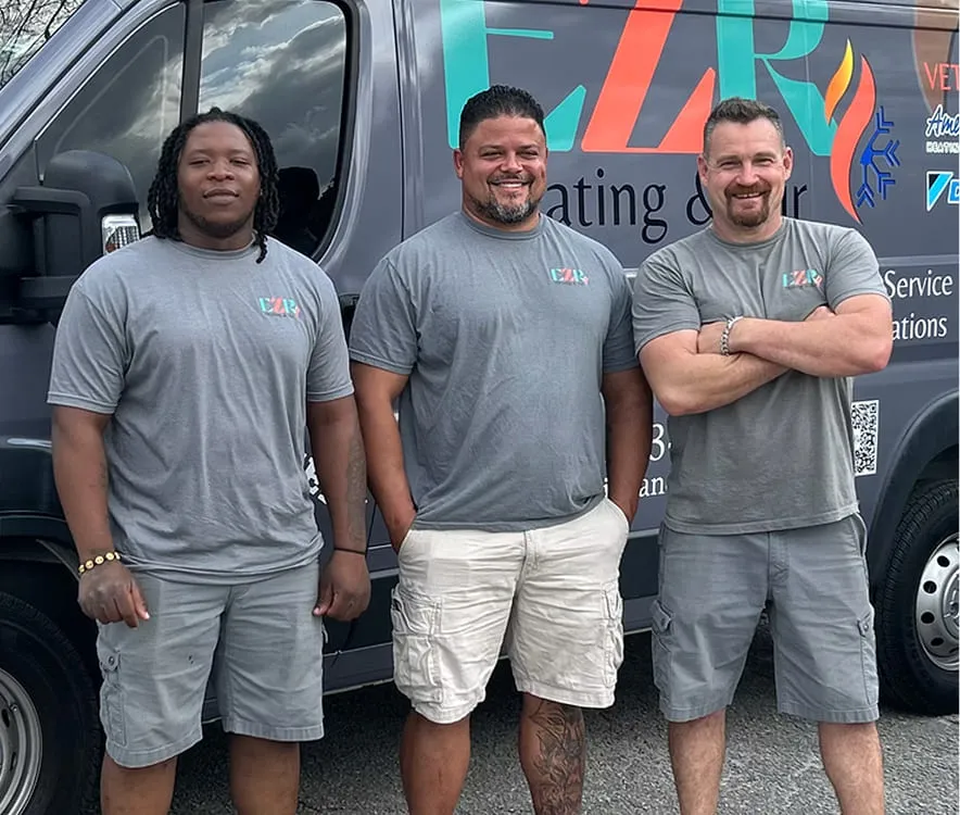 EZR Heating & Air team in front of service van